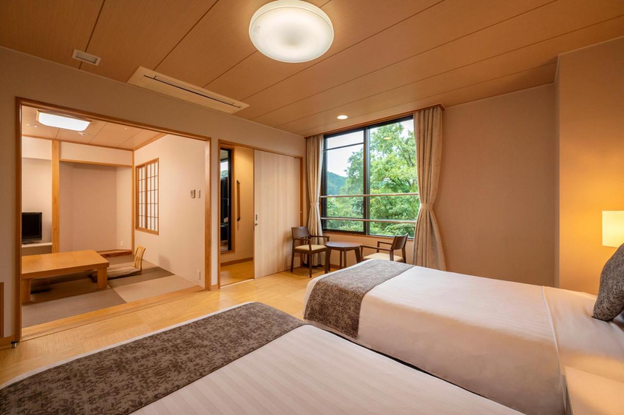 KAMENOI HOTEL Ome Rom bilde
